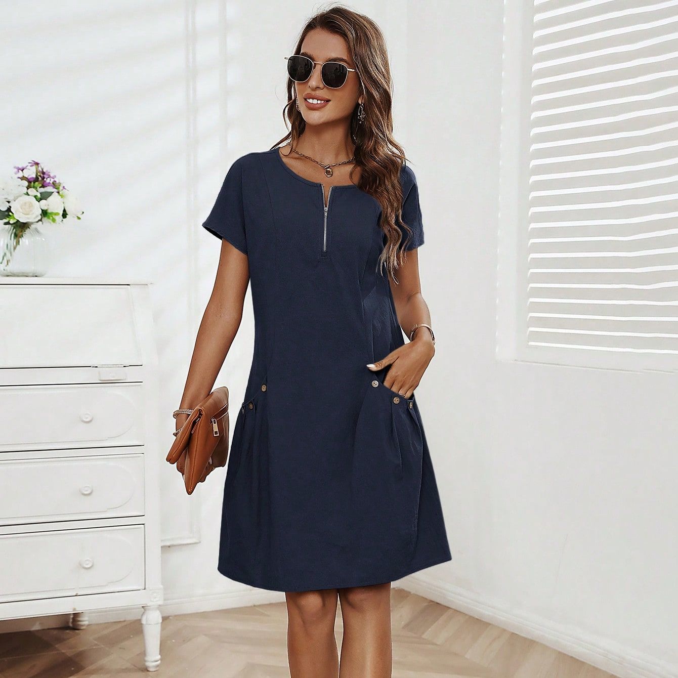 Robe évasée avec poches décoratives